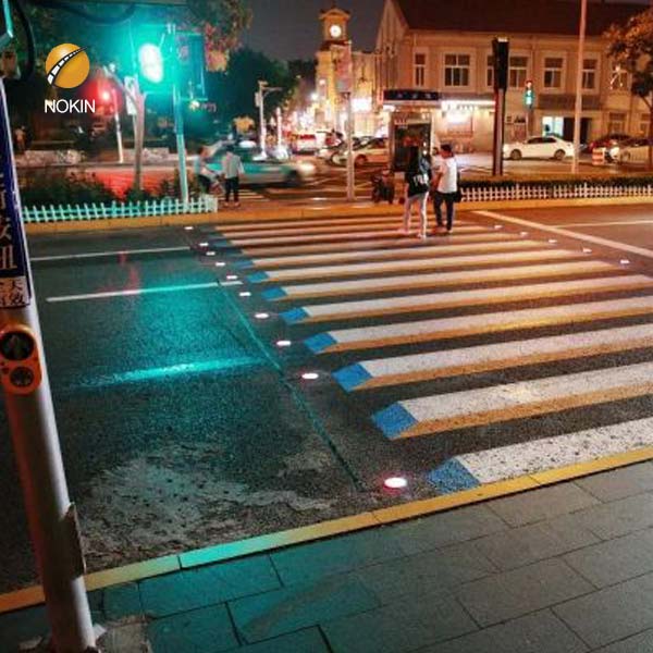 Blue Synchronized Solar Pavement Markers In Japan